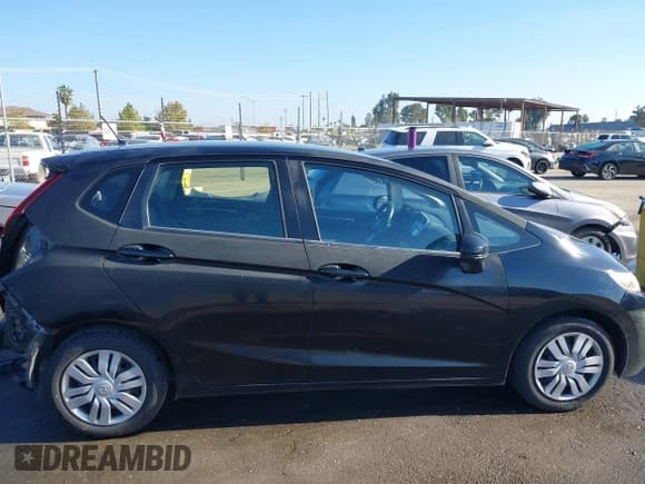 ✅ 2016 Honda Fit LX • VIN: JHMGK5H5XGX028667 • Лот: 43577874. Опубликован ранее на IAAI с пробегом 119 840 миль. Бесплатный доступ к архиву аукционных продаж из США и подробный отчёт об истории автомобиля на DreamBid. Изображение 14.