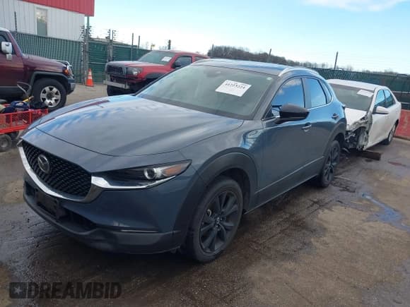 ✅ 2022 Mazda CX-30 S Carbon Edition • VIN: 3MVDMBCL0NM458115 • Lot: 41223224. Listed on IAAI with 67,066 mi. Free auction sales archive from the USA and detailed vehicle history report at DreamBid. Image 17.