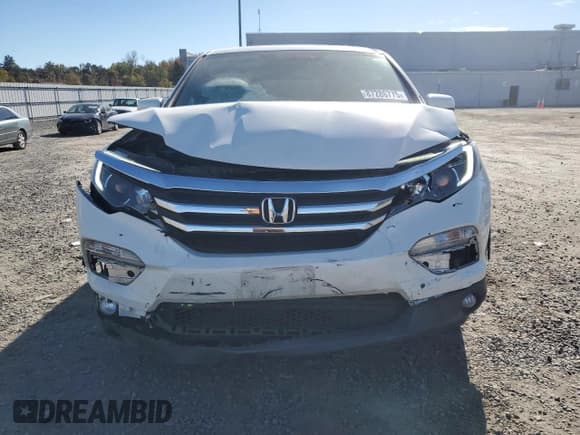 ✅ 2017 Honda Pilot EX-L • VIN: 5FNYF6H59HB051627 • Lot: 87286775. Listed on Copart with 104,700 mi. Free auction sales archive from the USA and detailed vehicle history report at DreamBid. Image 5.