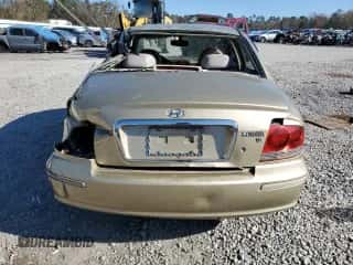 2004 Hyundai Sonata GLS with VIN KMHWF35H64A003084, listed as a Copart auction lot 83238544 with 179,054 mi miles and Salvage title. Bid and sale history available at DreamBid. Image 6.