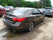 ✅ 2014 Infiniti Q50 Premium • VIN: JN1BV7AP0EM683304 • Lot: 42299793. Listed on IAAI with 195,328 mi. Free auction sales archive from the USA and detailed vehicle history report at DreamBid. Image 4.