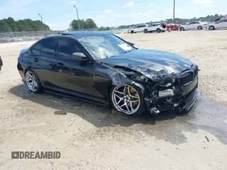 2022 BMW 3 Series M340i z VIN 3MW5U7J06N8C25602, wystawiony jako IAAI lot #43132526 z przebiegiem 73 771 mil mil oraz . Historia ofert i sprzedaży dostępna na DreamBid. Obrazek 1.