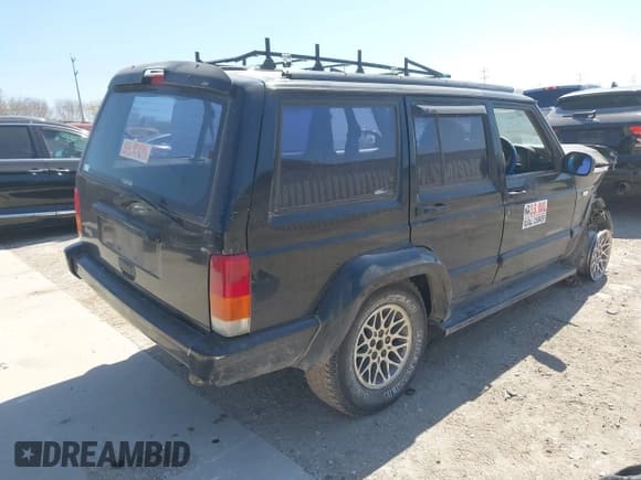 ✅ 1999 Jeep Cherokee • VIN: 1J4FN68S4WL268314 • Lot: 41749561. Listed on IAAI with Not provided. Free auction sales archive from the USA and detailed vehicle history report at DreamBid. Image 4.
