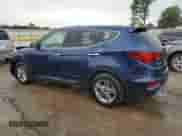 2018 Hyundai Santa Fe 2.4L z VIN 5XYZTDLBXJG548442, wystawiony jako Copart lot #71490095 z przebiegiem 125 249 mil mil oraz Szkoda całkowita • Salvage title. Historia ofert i sprzedaży dostępna na DreamBid. Obrazek 2.