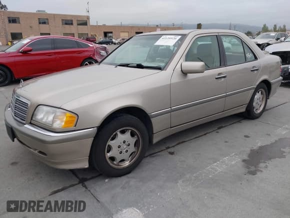 ✅ 1999 Mercedes-Benz C 230/260/280/320 • VIN: WDBHA29G8XA784619 • Lot: 42120920. Listed on IAAI with 49,387 mi. Free auction sales archive from the USA and detailed vehicle history report at DreamBid. Image 17.