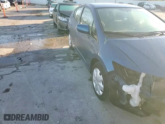 ✅ 2014 Honda Insight LX • VIN: JHMZE2H56ES002057 • Lot: 90787315. Wystawiony na Copart z przebiegiem 106 298 mil. Bezpłatny archiwum sprzedaży aukcyjnych z USA i szczegółowy raport historii pojazdu na DreamBid. Zdjęcie 13.