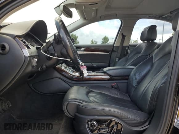 ✅ 2015 Audi A8 • VIN: WAUJGAFD7FN039435 • Lot: 65351645. Listed on Copart with 142,227 mi. Free auction sales archive from the USA and detailed vehicle history report at DreamBid. Image 7.