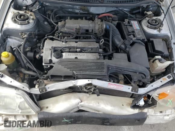 ✅ 2001 Mazda Protege DX • VIN: JM1BJ222310425181 • Lot: 88560255. Wystawiony na Copart z przebiegiem 201 942 mil. Bezpłatny archiwum sprzedaży aukcyjnych z USA i szczegółowy raport historii pojazdu na DreamBid. Zdjęcie 11.