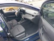 ✅ 2023 Toyota Corolla Hybrid LE • VIN: JTDBDMHE5PJ002321 • Lot: 42257802. Listed on IAAI with 28,728 mi. Free auction sales archive from the USA and detailed vehicle history report at DreamBid. Image 5.