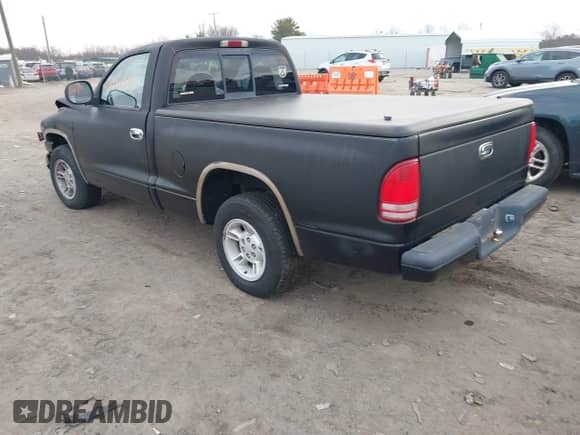 2000 Dodge Dakota with VIN 1B7FL26X8YS606213, listed as a IAAI auction lot 41371391 with 147,911 mi miles and . Bid and sale history available at DreamBid. Image 3.