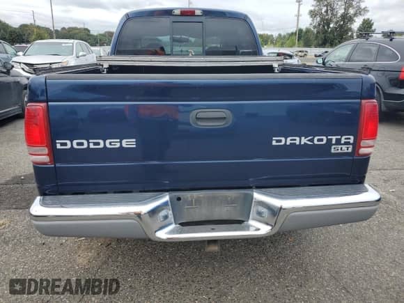 2004 Dodge Dakota SLT z VIN 1D7HG48N94S688652, wystawiony jako Copart lot #71942564 z przebiegiem 141 942 mil mil oraz Szkoda całkowita • Salvage title. Historia ofert i sprzedaży dostępna na DreamBid. Obrazek 6.