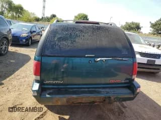 ✅ 1996 GMC Jimmy SL • VIN: 1GKCS13W0T2553905 • Лот: 71007674. Опубликован ранее на Copart с пробегом 169 513 миль. Бесплатный доступ к архиву аукционных продаж из США и подробный отчёт об истории автомобиля на DreamBid. Изображение 6.