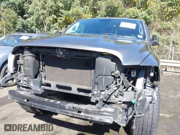 2013 Ram 1500 Express z VIN 3C6JR6ATXDG505915, wystawiony jako IAAI lot #43504506 z przebiegiem 171 665 mil mil oraz . Historia ofert i sprzedaży dostępna na DreamBid. Obrazek 6.