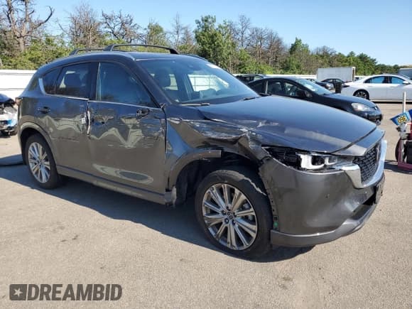 ✅ 2023 Mazda CX-5 Signature • VIN: JM3KFBXY0P0244795 • Lot: 65770745. Listed on Copart with 28,247 mi. Free auction sales archive from the USA and detailed vehicle history report at DreamBid. Image 4.