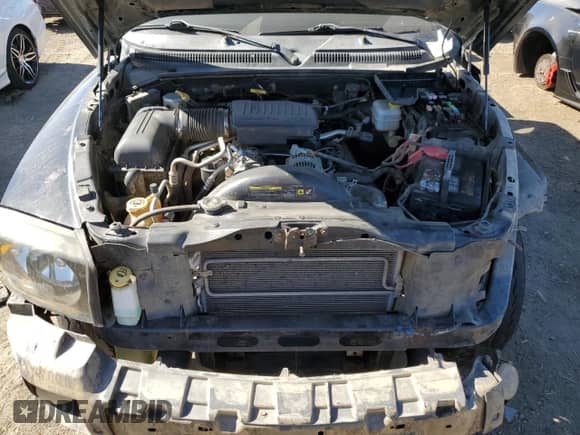 2007 Dodge Dakota SLT z VIN 1D7HW48J07S241356, wystawiony jako Copart lot #75355384 z przebiegiem 207 020 mil mil oraz Szkoda całkowita • Salvage title. Historia ofert i sprzedaży dostępna na DreamBid. Obrazek 12.