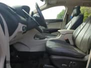 ✅ 2017 Lincoln MKC Reserve • VIN: 5LMCJ3D97HUL32258 • Lot: 70592315. Wystawiony na Copart z przebiegiem 93 447 mil. Bezpłatny archiwum sprzedaży aukcyjnych z USA i szczegółowy raport historii pojazdu na DreamBid. Zdjęcie 7.