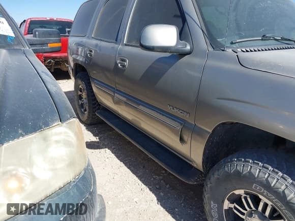 ✅ 2001 GMC Yukon SLT • VIN: 1GKEK13T11R164029 • Lot: 41518776. Listed on IAAI with 329,836 mi. Free auction sales archive from the USA and detailed vehicle history report at DreamBid. Image 6.