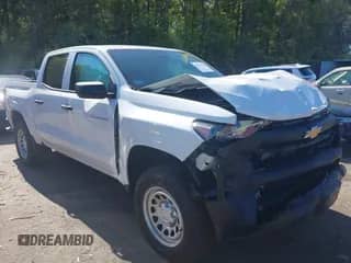 2024 Chevrolet Colorado 4WD Work Truck z VIN 1GCPTBEK0R1306831, wystawiony jako IAAI lot #42120705 z przebiegiem 1 205 mil mil oraz . Historia ofert i sprzedaży dostępna na DreamBid. Obrazek 1.