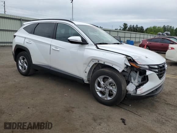 ✅ 2022 Hyundai Tucson SEL • VIN: 5NMJBCAE2NH141301 • Lot: 54353574. Wystawiony na Copart z przebiegiem 20 923 mil. Bezpłatny archiwum sprzedaży aukcyjnych z USA i szczegółowy raport historii pojazdu na DreamBid. Zdjęcie 4.