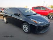 ✅ 2021 Toyota Prius L Eco • VIN: JTDKAMFU4M3148468 • Lot: 42710611. Listed on IAAI with 160,129 mi. Free auction sales archive from the USA and detailed vehicle history report at DreamBid. Image 1.