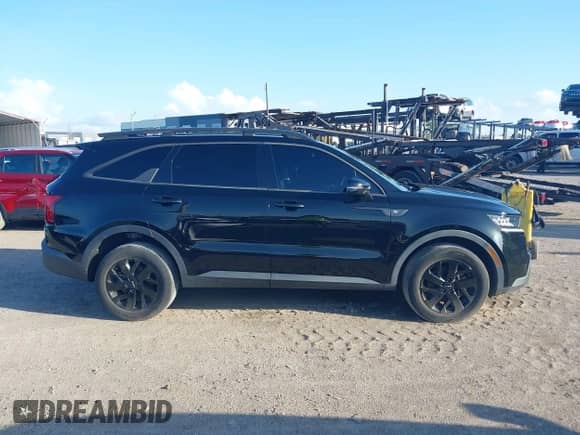 2022 Kia Sorento X-Line S z VIN 5XYRLDLC4NG102771, wystawiony jako IAAI lot #42654251 z przebiegiem 39 228 mil mil oraz . Historia ofert i sprzedaży dostępna na DreamBid. Obrazek 13.