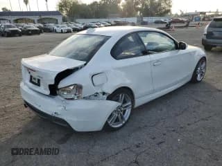 ✅ 2013 BMW 1 Series 135i • VIN: WBAUC9C58DVY60514 • Lot: 85606494. Listed on Copart with 80,417 mi. Free auction sales archive from the USA and detailed vehicle history report at DreamBid. Image 3.