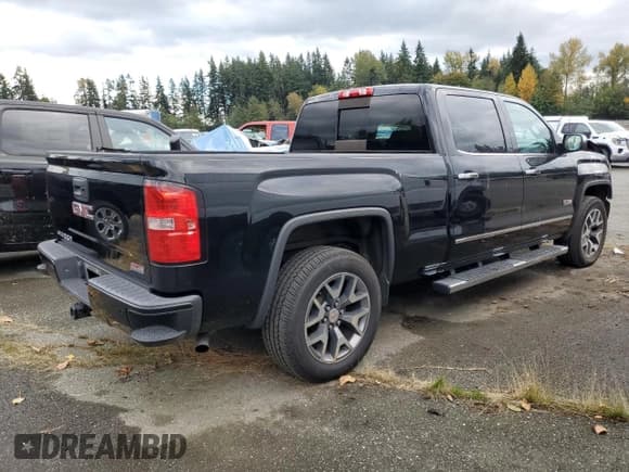 ✅ 2015 GMC Sierra 1500 SLT • VIN: 3GTU2VEC7FG168993 • Lot: 82728815. Listed on Copart with 103,439 mi. Free auction sales archive from the USA and detailed vehicle history report at DreamBid. Image 3.
