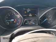 ✅ 2015 Ford Focus Titanium • VIN: 1FADP3J24FL387048 • Lot: 82431245. Listed on Copart with 124,984 mi. Free auction sales archive from the USA and detailed vehicle history report at DreamBid. Image 9.