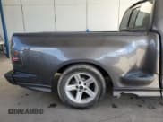 ✅ 2003 Ford F-150 Lightning • VIN: 2FTRF07313CA52692 • Lot: 44399975. Listed on Copart with 78,773 mi. Free auction sales archive from the USA and detailed vehicle history report at DreamBid. Image 10.