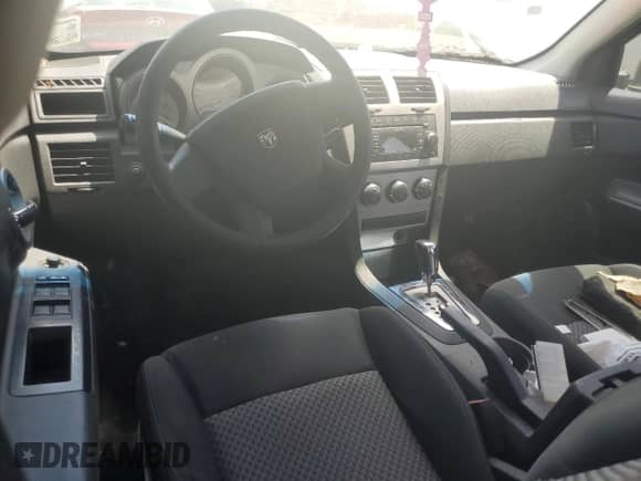 2009 Dodge Avenger SE z VIN 1B3LC46B29N564853, wystawiony jako Copart lot #64755385 z przebiegiem 158 741 mil mil oraz Szkoda całkowita • Salvage title. Historia ofert i sprzedaży dostępna na DreamBid. Obrazek 8.