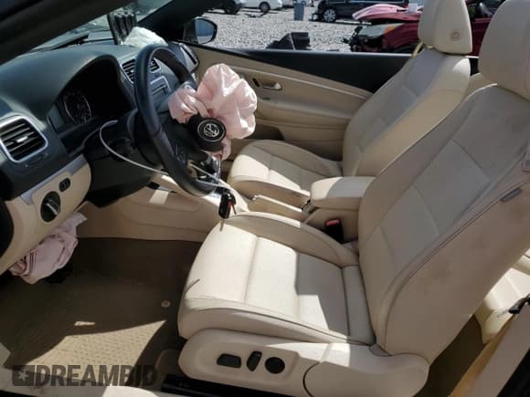 ✅ 2013 Volkswagen Eos Sport • VIN: WVWBW8AH6DV004170 • Лот: 86692455. Опубликован ранее на Copart с пробегом 52 592 миль. Бесплатный доступ к архиву аукционных продаж из США и подробный отчёт об истории автомобиля на DreamBid. Изображение 7.