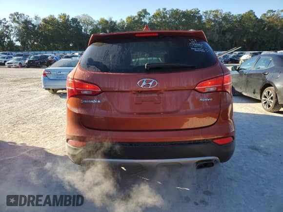 2015 Hyundai Santa Fe с VIN 5XYZU3LB2FG243581, выставлен на аукционе Copart как лот 90817795 с пробегом 284 919 миль миль и Списание • Salvage title. История ставок и продаж доступна на DreamBid. Изображение 6.