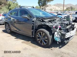 ✅ 2022 Lexus UX 250h F Sport • VIN: JTHE9JBHXN2057109 • Lot: 42265432. Listed on IAAI with 76,822 mi. Free auction sales archive from the USA and detailed vehicle history report at DreamBid. Image 1.