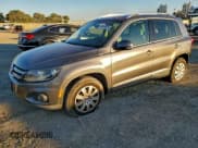 ✅ 2013 Volkswagen Tiguan S • VIN: WVGBV3AX6DW596415 • Lot: 95999515. Listed on Copart with 124,925 mi. Free auction sales archive from the USA and detailed vehicle history report at DreamBid. Image 1.