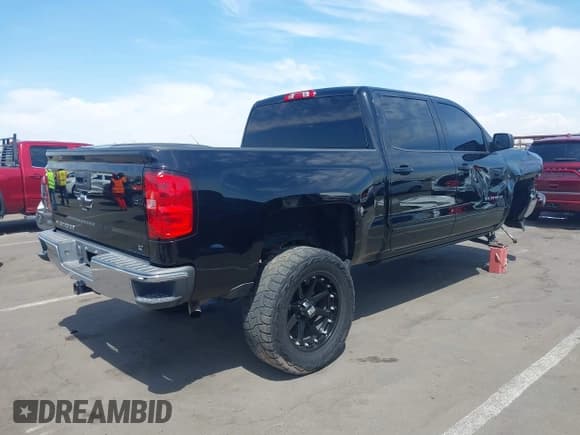 ✅ 2015 Chevrolet Silverado 1500 LT • VIN: 3GCPCRECXFG475382 • Lot: 42142399. Listed on IAAI with 133,608 mi. Free auction sales archive from the USA and detailed vehicle history report at DreamBid. Image 4.