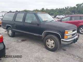 1994 Chevrolet Suburban z VIN 1GNFK16K4RJ369347, wystawiony jako IAAI lot #43410847 z przebiegiem 170 840 mil mil oraz . Historia ofert i sprzedaży dostępna na DreamBid. Obrazek 1.
