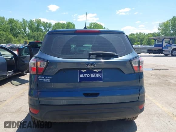 ✅ 2018 Ford Escape S • VIN: 1FMCU0F79JUA63979 • Lot: 42184819. Listed on IAAI with 125,720 mi. Free auction sales archive from the USA and detailed vehicle history report at DreamBid. Image 16.