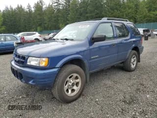 ✅ 2002 Isuzu Rodeo S • VIN: 4S2CK58W124301647 • Lot: 56973895. Wystawiony na Copart z przebiegiem 129 009 mil. Bezpłatny archiwum sprzedaży aukcyjnych z USA i szczegółowy raport historii pojazdu na DreamBid. Zdjęcie 1.