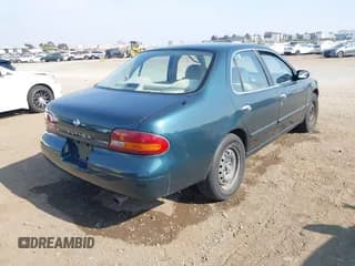 ✅ 1993 Nissan Altima GLE • VIN: 1N4BU31F1PC156595 • Lot: 42654230. Listed on IAAI with 122,658 mi. Free auction sales archive from the USA and detailed vehicle history report at DreamBid. Image 4.