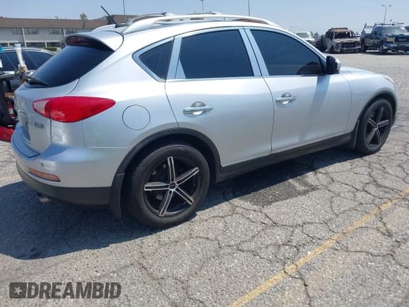 ✅ 2010 Infiniti EX • VIN: JN1AJ0HP0AM700469 • Lot: 42803866. Listed on IAAI with 105,292 mi. Free auction sales archive from the USA and detailed vehicle history report at DreamBid. Image 4.