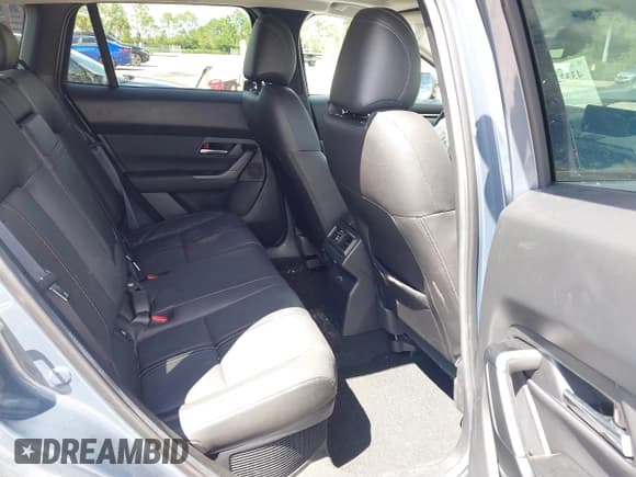 ✅ 2025 Mazda CX-50 Hybrid Premium Plus Package • VIN: 7MMVAAEW9SN127423 • Lot: 43322908. Wystawiony na IAAI z przebiegiem 2 928 mil. Bezpłatny archiwum sprzedaży aukcyjnych z USA i szczegółowy raport historii pojazdu na DreamBid. Zdjęcie 8.