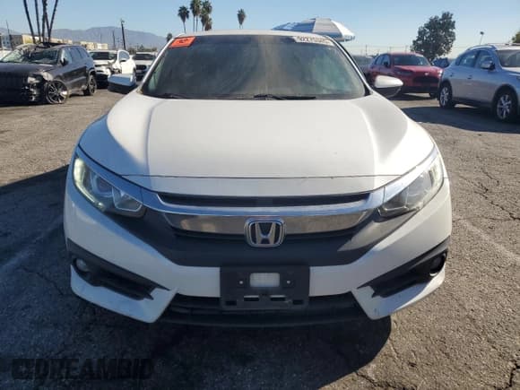 ✅ 2018 Honda Civic EX-T • VIN: 2HGFC3B35JH354086 • Lot: 92275345. Wystawiony na Copart z przebiegiem 103 252 mil. Bezpłatny archiwum sprzedaży aukcyjnych z USA i szczegółowy raport historii pojazdu na DreamBid. Zdjęcie 5.