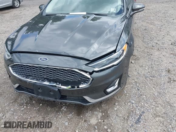 ✅ 2020 Ford Fusion Titanium • VIN: 3FA6P0D97LR116854 • Lot: 43081513. Listed on IAAI with 97,625 mi. Free auction sales archive from the USA and detailed vehicle history report at DreamBid. Image 6.