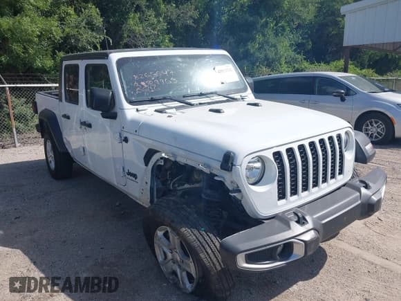 ✅ 2023 Jeep Gladiator Sport S • VIN: 1C6HJTAGXPL539965 • Лот: 42552742. Опубликован ранее на IAAI с пробегом 57 918 миль. Бесплатный доступ к архиву аукционных продаж из США и подробный отчёт об истории автомобиля на DreamBid. Изображение 1.