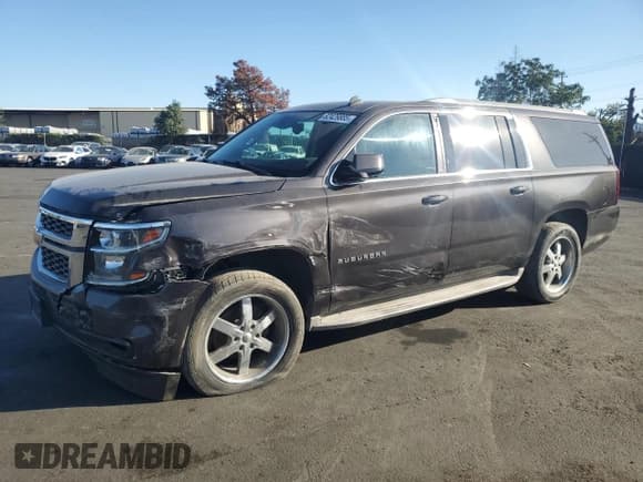 ✅ 2015 Chevrolet Suburban LT • VIN: 1GNSCJKC2FR238845 • Lot: 82429885. Listed on Copart with 65,404 mi. Free auction sales archive from the USA and detailed vehicle history report at DreamBid. Image 1.