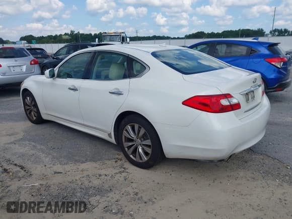 ✅ 2012 Infiniti M • VIN: JN1BY1AP4CM331828 • Lot: 42866677. Listed on IAAI with 174,515 mi. Free auction sales archive from the USA and detailed vehicle history report at DreamBid. Image 3.