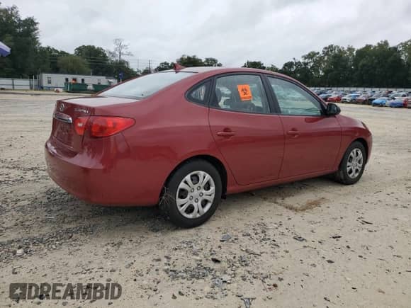 2010 Hyundai Elantra GLS z VIN KMHDU4ADXAU080993, wystawiony jako Copart lot #74888784 z przebiegiem Nie podano mil oraz Szkoda całkowita • Salvage title. Historia ofert i sprzedaży dostępna na DreamBid. Obrazek 3.