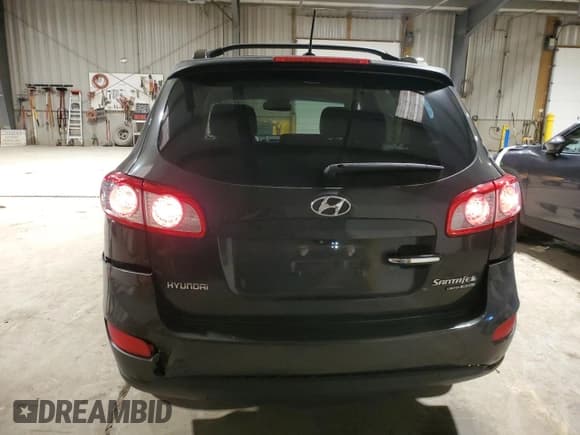✅ 2011 Hyundai Santa Fe Limited • VIN: 5XYZKDAG1BG058782 • Lot: 82202084. Listed on Copart with 127,953 mi. Free auction sales archive from the USA and detailed vehicle history report at DreamBid. Image 6.