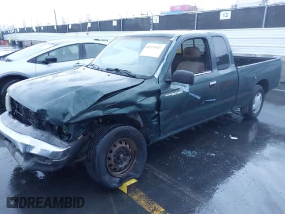 ✅ 1999 Toyota Tacoma • VIN: 4TAVL52N6XZ530719 • Lot: 43753647. Listed on IAAI with 240,331 mi. Free auction sales archive from the USA and detailed vehicle history report at DreamBid. Image 2.