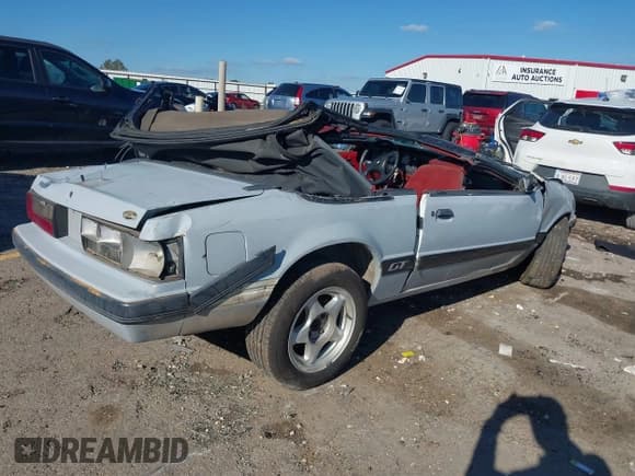 ✅ 1986 Ford Mustang • VIN: 1FABP27M9GF164773 • Lot: 43562859. Listed on IAAI with 79,061 mi. Free auction sales archive from the USA and detailed vehicle history report at DreamBid. Image 4.